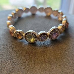 Silver tone bracelet with multi colored gems
